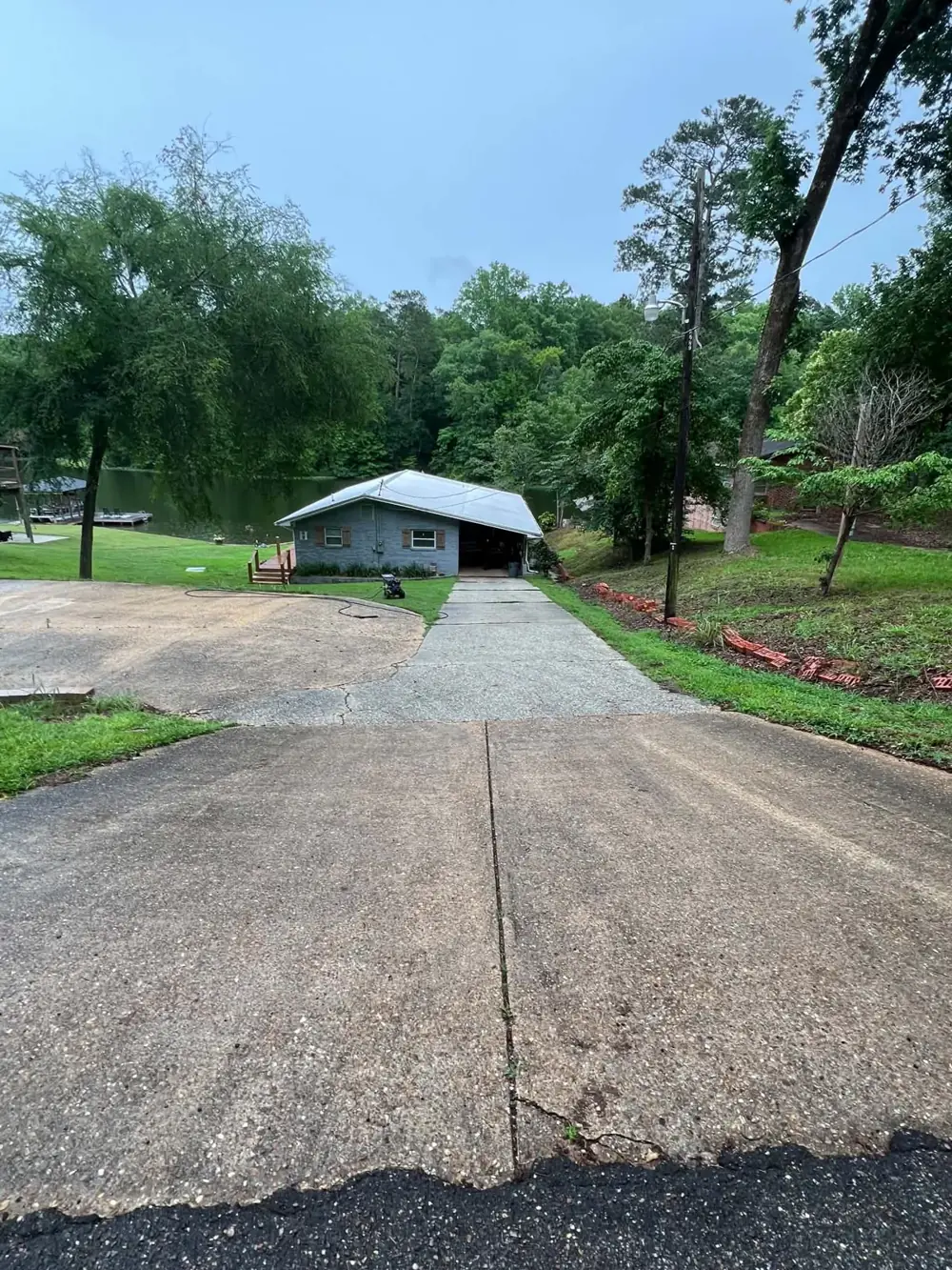 Dirty stained driveway before pressure washing in Central Alabama